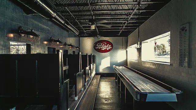 Indoor shuffleboard table in a bar